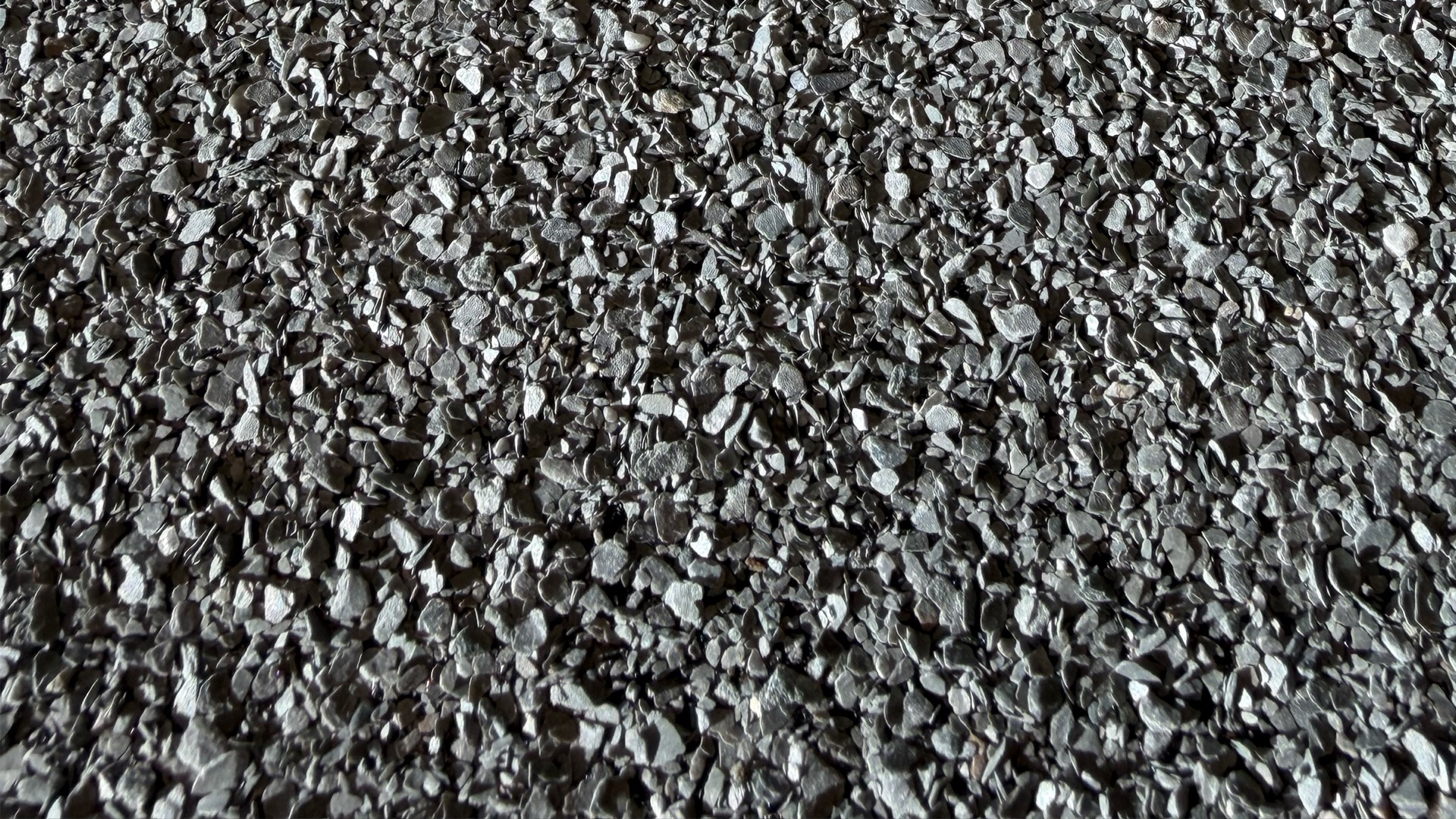 Natural slate surface showing flat slate flakes